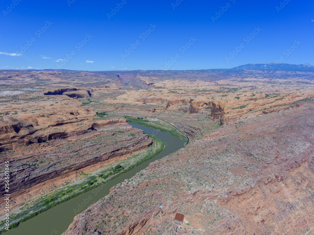 Aerial view of Colorado River and La Sal Mountains near Arches National Park in Moab, Utah, USA.