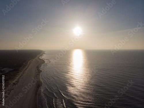 Curonian Spit and the Baltic Sea. View from the copter. Coastline with the beach and the sea. Nature conservation. View from the sky. The photo was taken by drone quadcopter. © AlesiaKan