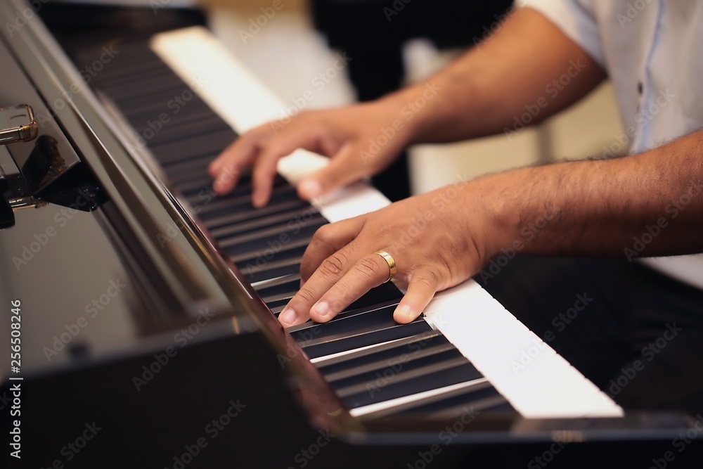 Fototapeta premium hands playing piano
