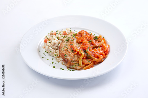 cutlet with barley on the white background