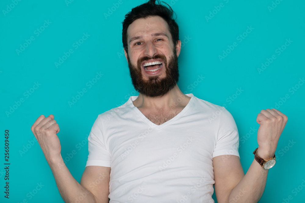 Fototapeta premium Portrait of cheerful smiling bearded man