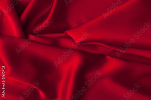 Luxury red satin fabric cloth abstract background