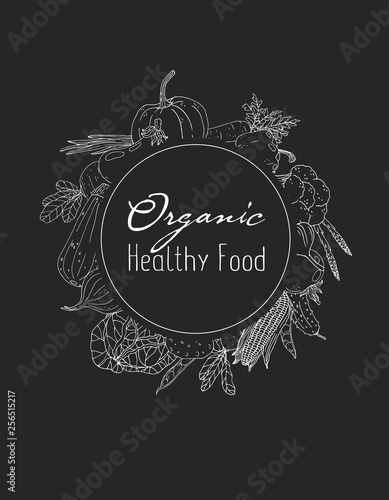 Poster with hand drawn vegetables on a chalkboard background.