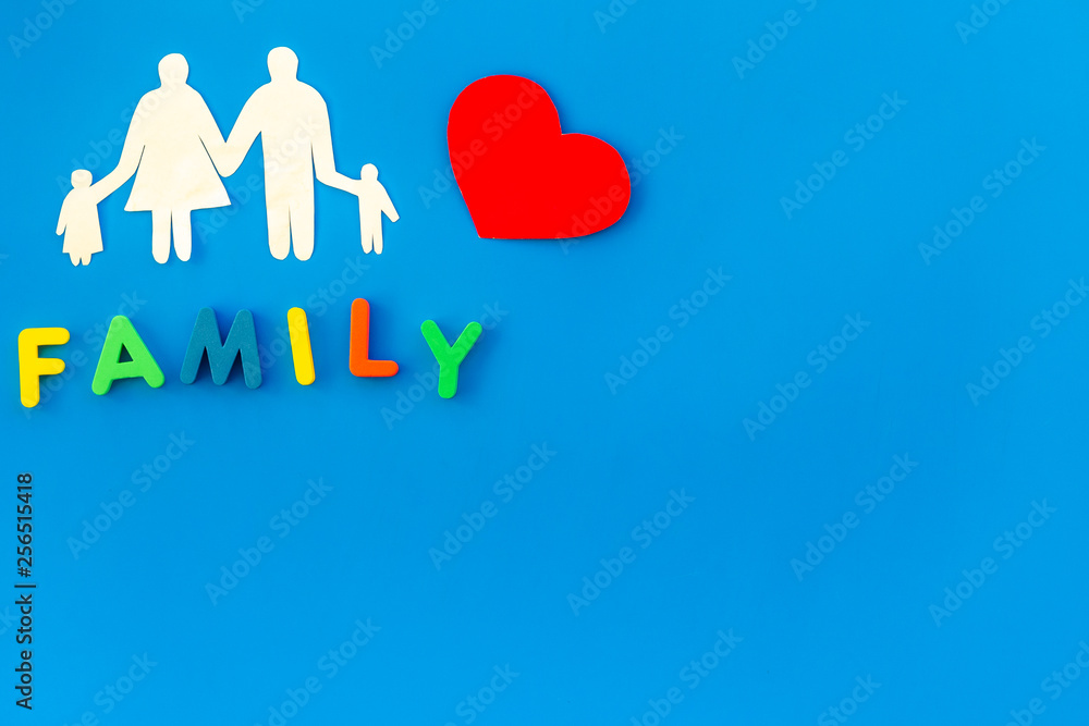 family copy and figures on blue background top view copyspace family copy and figures on blue background top view copyspace