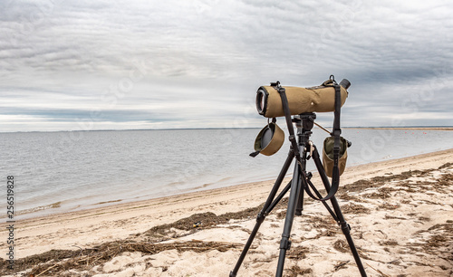 Obraz na płótnie Close up of the telescope on the beach, ready to watch birds. w salonie