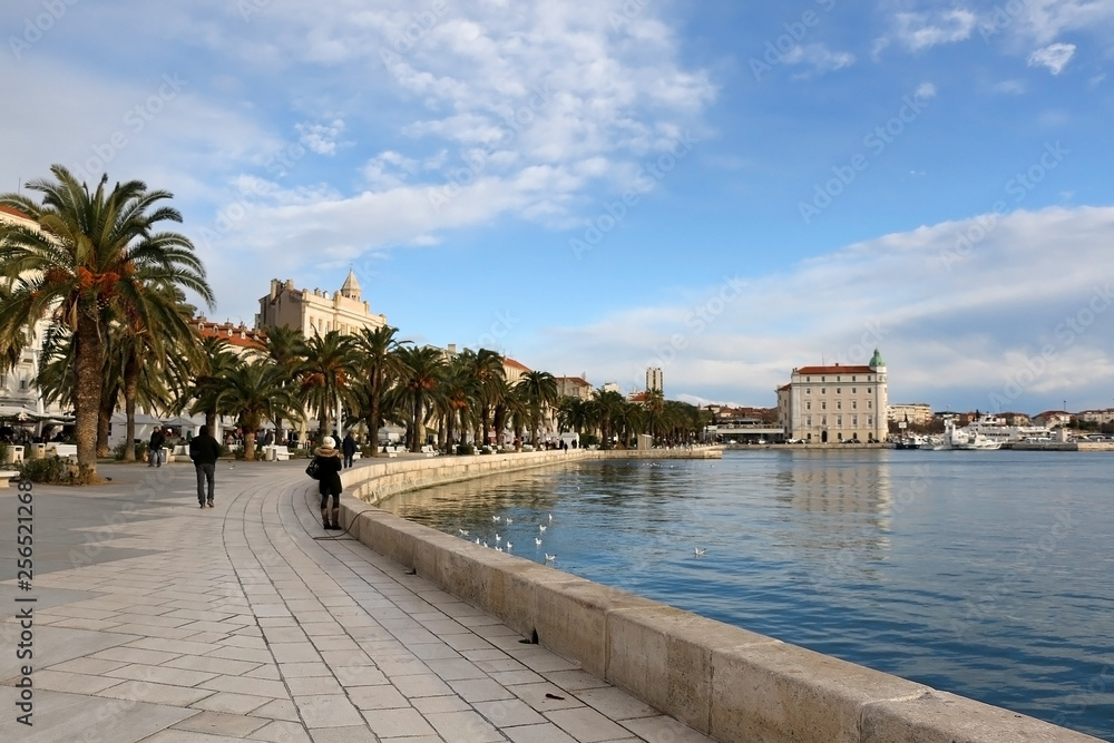 Sunny winter day on Riva promenade in Split, Croatia. Split is popular travel destination. 