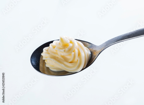 spoon with sauce isolated on white background
