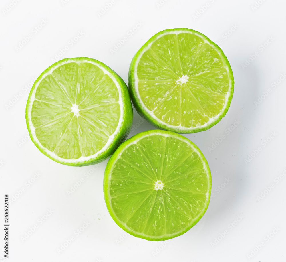 a slice of lime, isolated on white background a slice of lime, isolated on white background