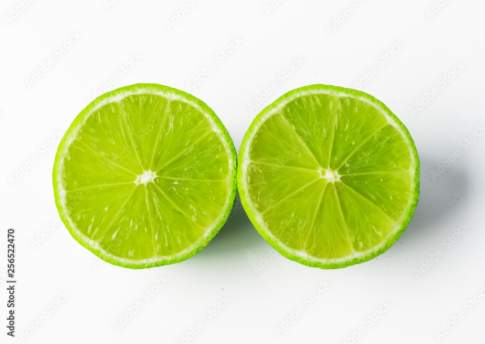 a slice of lime, isolated on white background a slice of lime, isolated on white background