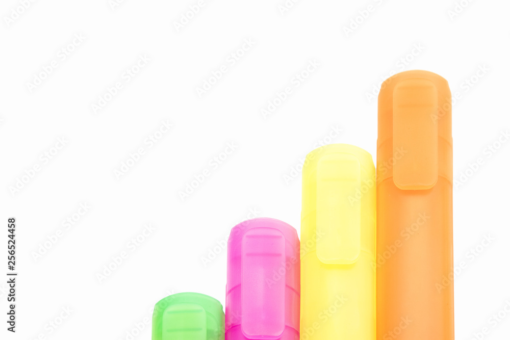 isolated yellow, orange, green and purple markers on the white background isolated yellow, orange, green and purple markers on the white background