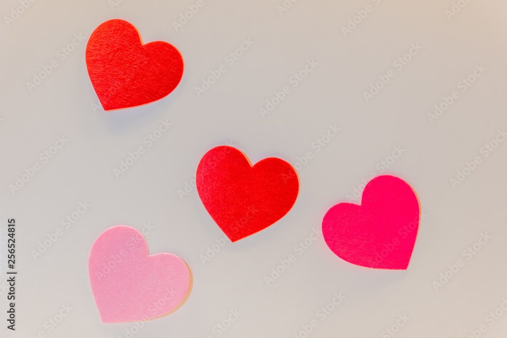 Background of hearts in pink and red