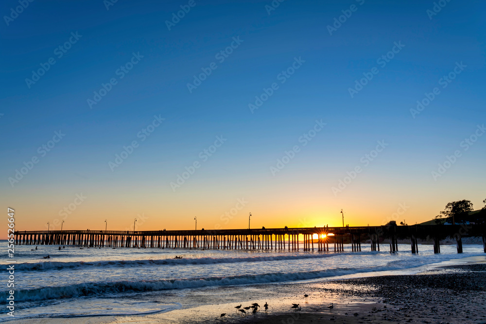 Sunburst at Sunset at Pier and Beach Sunburst at Sunset at Pier and Beach