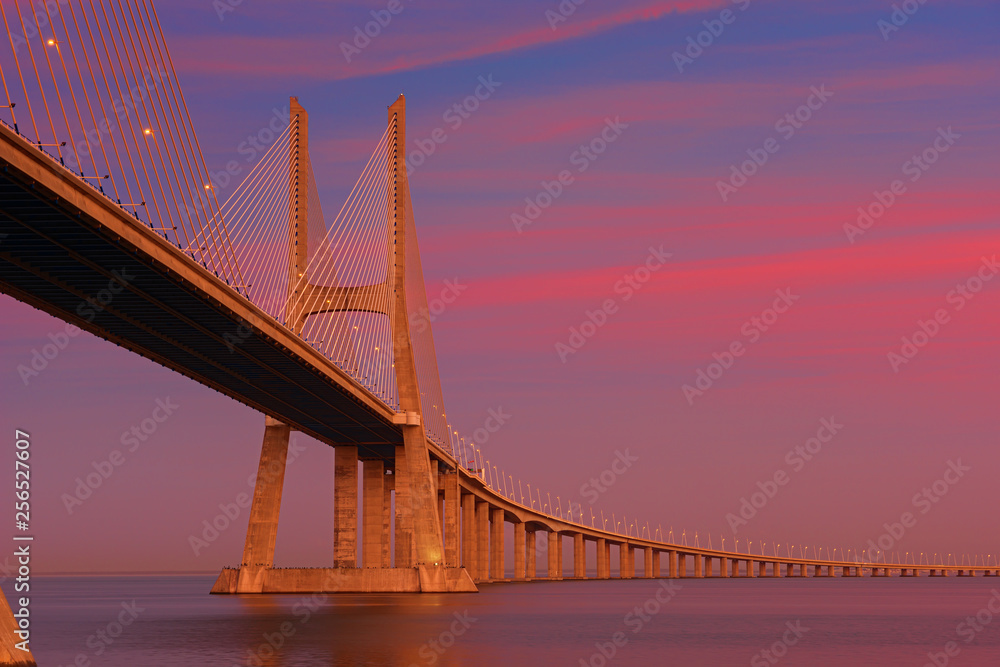 Obraz premium Vasco da Gama bridge at sunset . Lisbon, Portugal.