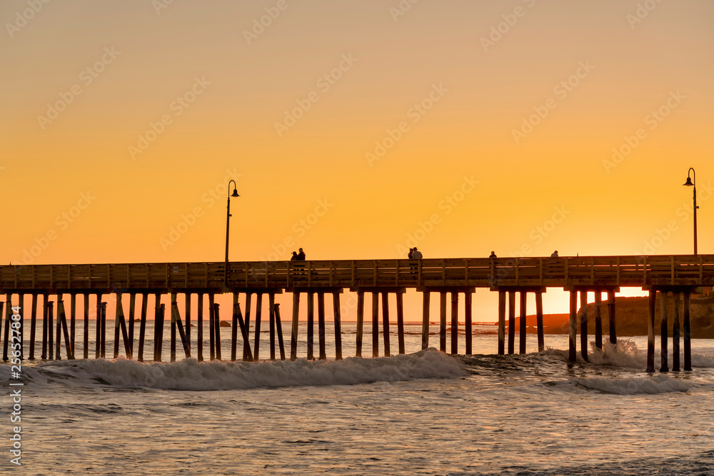 Orange sunset at the Beach and Pier 
