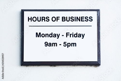 Hours of business sign Monday to Friday