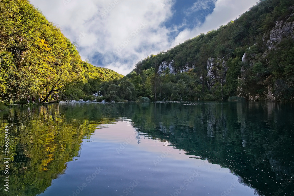 Obraz premium Beautiful lake with the blue water between green hills. Plitvice Lakes, Croatia.