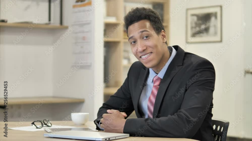 Yes, African Businessman Accepting Offer at Work Yes, African Businessman Accepting Offer at Work