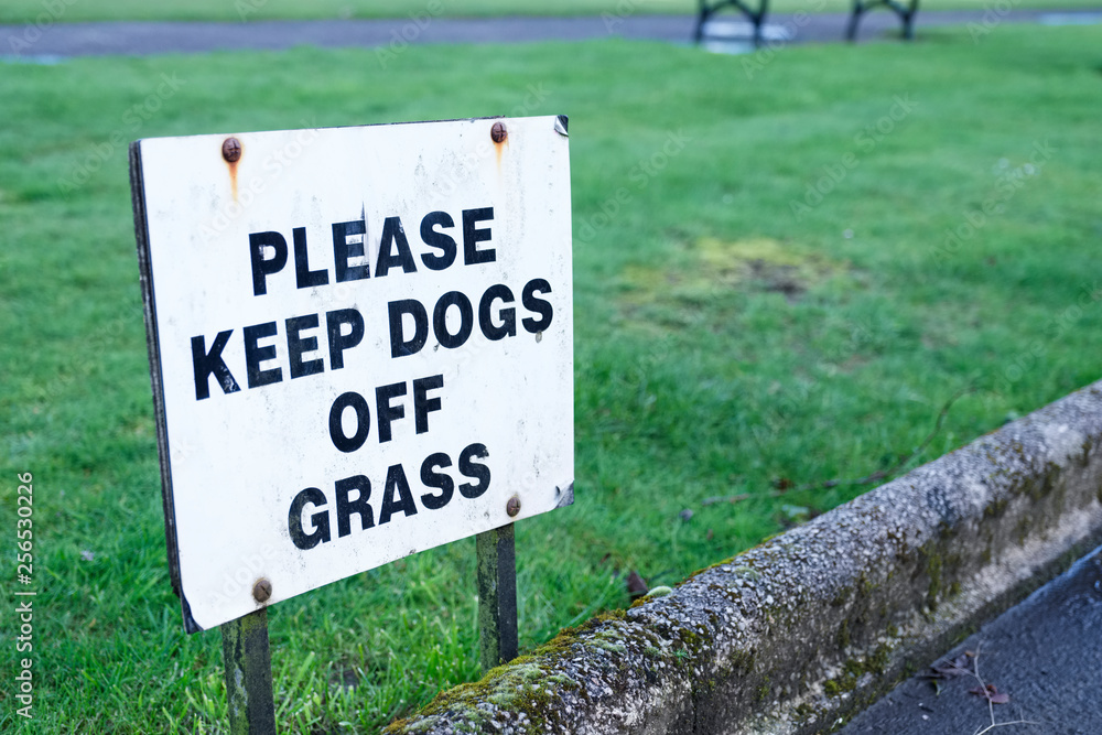 Keep dogs off grass sign