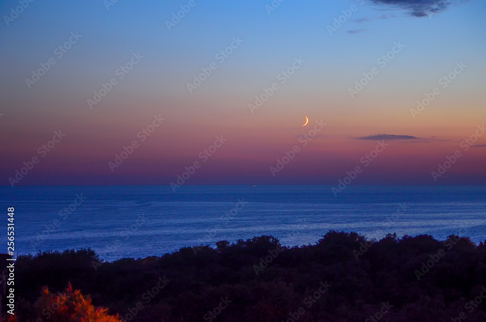 Spectacular sea sunset from the beach of the naturist camping of Cervar Porec (Parenzo), Istria, Croatia
