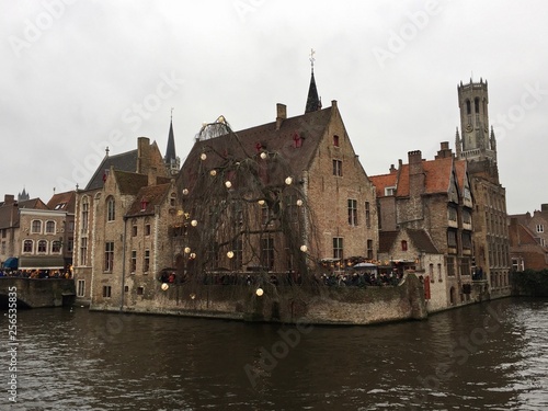 The Rozenhoedkaai (Quay of the Rosary) with the Belfry of Bruges in the background is the most photographed area of ​​Bruges, West Flanders, Belgium.