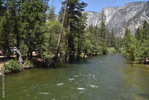 Yosemite National Park, CA., U.S.A. June 25, 2017. Mercer river at flood stage out of its banks throughout Yosemite National Park valley.   photo