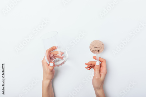 Woman making protein shake, top view © progressman
