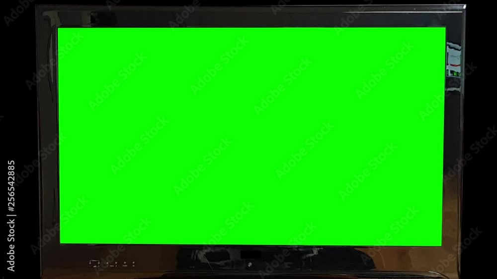 Modern flat Tv Green Screen on black Background Zooming out Slowly. Replace green screen with your own text or footage. Modern flat Tv Green Screen on black Background Zooming out Slowly. Replace green screen with your own text or footage.
