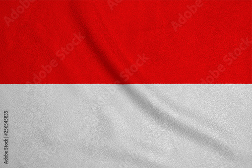 Flag of the Indonesia from the factory knitted fabric. Backgrounds and Textures