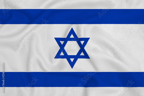 Flag of the Israel from the factory knitted fabric. Backgrounds and Textures