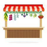 Counter of vegetable kiosk with suspended herbs, onion and corn flat isolated