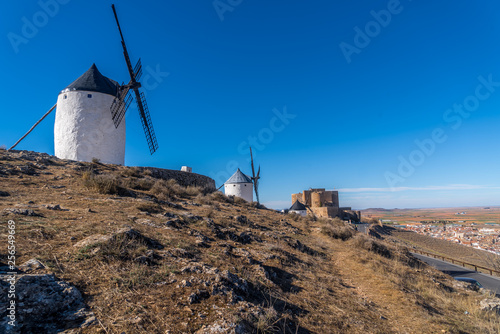 Consuegra castle and windmills aerial view with blue sky in La Mancha Spain famous Don Quixote site