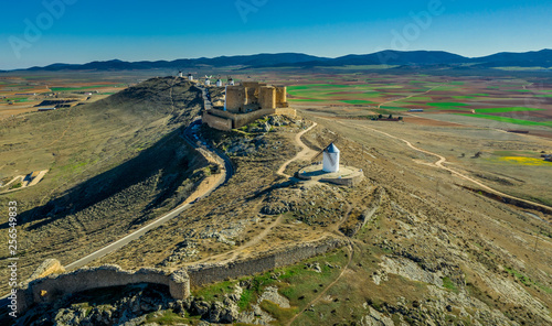 Consuegra castle and windmills aerial view with blue sky in La Mancha Spain famous Don Quixote site