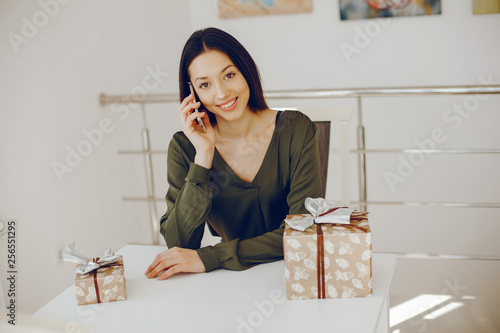 elegant girl in a green blouse photo