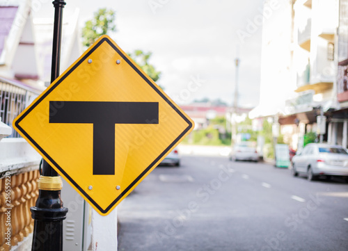 Metal Plate Traffic Sign: Intersection, Three way Junction, Split, Separate. The diamond shape sign with black T junction on yellow background, warning no more road straight ahead, minor to major road