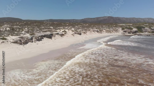 AERIAL: Beautiful Coastline with lovely Beach next to South African Garden Route