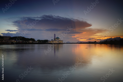 wonderful sunset with islamic mosque and bridge at kuching sarawak