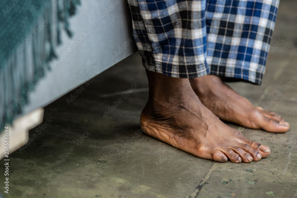 Close up of feet touching the floor