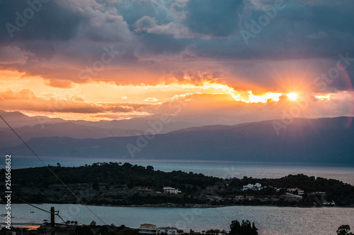 Scenic sunset over the sea in Portoheli on Peloponnese in Greece photo