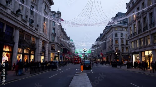 Day to night time-lapse of Regent street with Christmas lights at Christmas London England