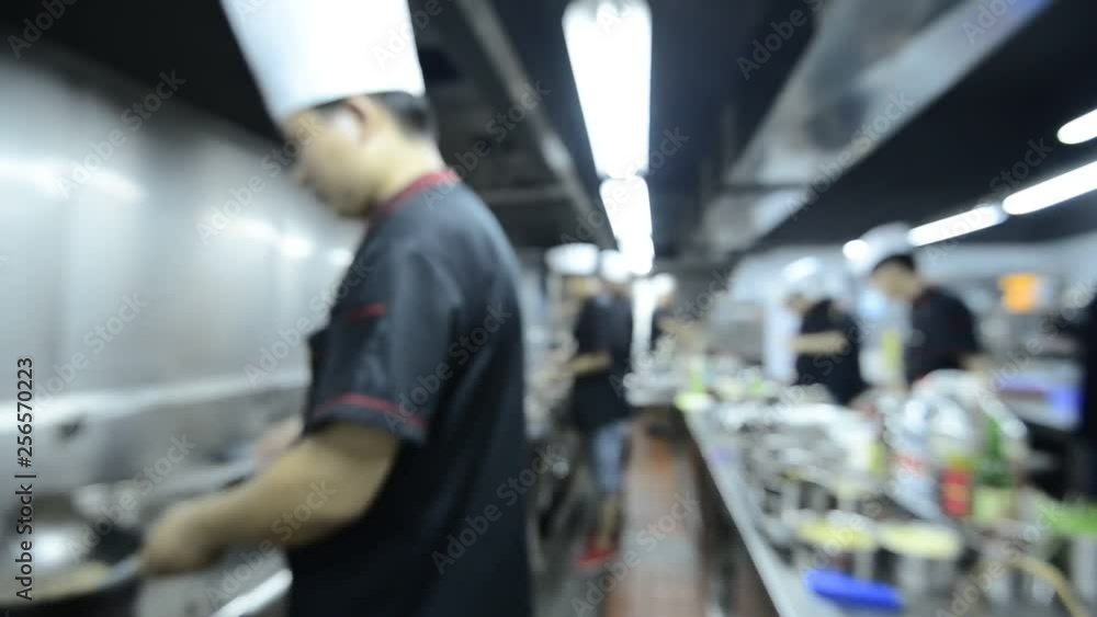 motion chefs of a restaurant kitchen motion chefs of a restaurant kitchen