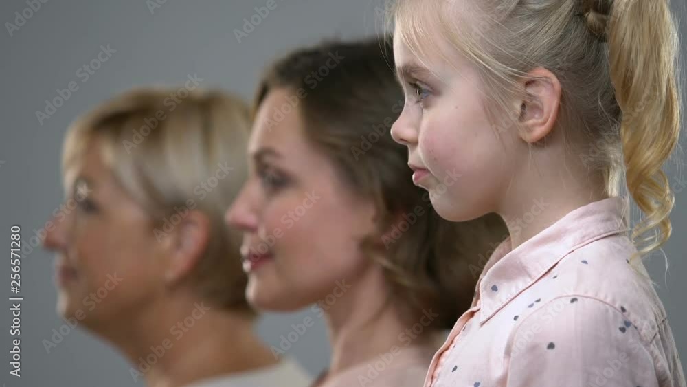 Side portrait of three female generations, birthrate and population ageing Side portrait of three female generations, birthrate and population ageing