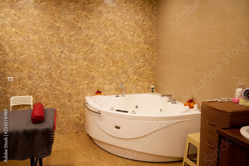 Принти на полотні Romantic bathtub with candlelight and red petals