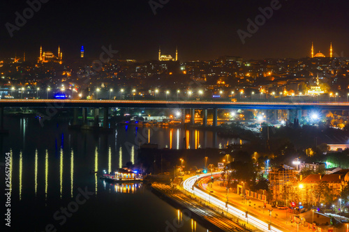 Istanbul, Turkey Night views from the Eyüp neighborhood over the Golden Horn.