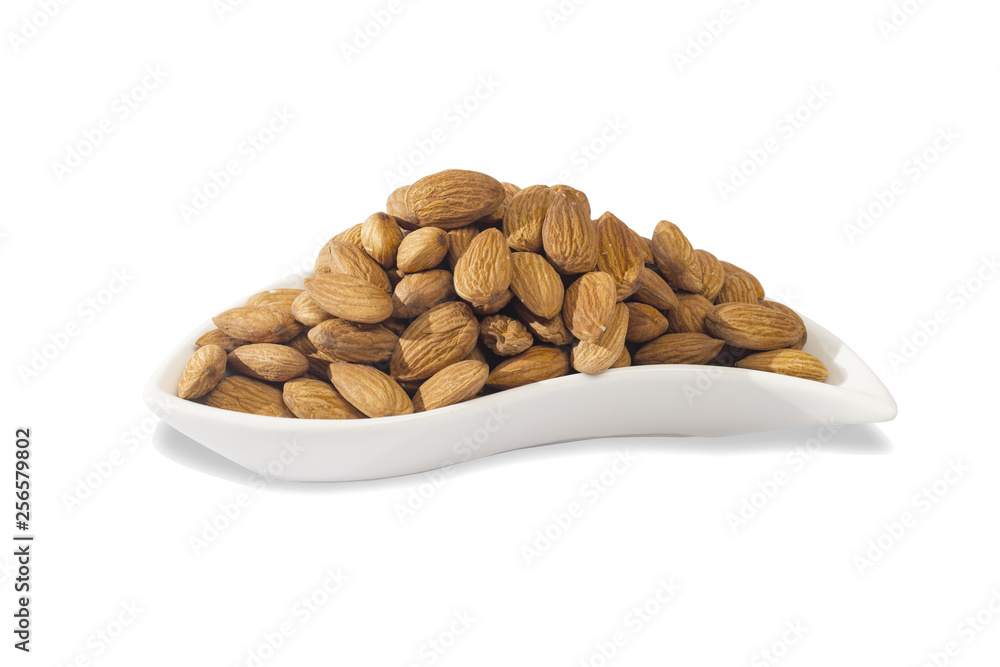 Obraz premium nuts dried fruits and healthy foods hazelnut nuts, almonds, walnut, peanut, cashew on white background