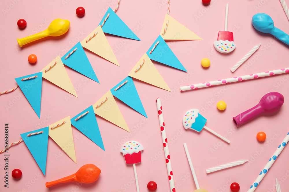 Carnival and party decor. Sweet candy, balloons, straw. Birthday background.