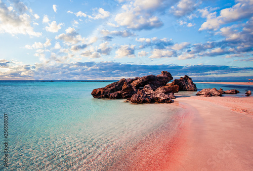 Fototapeta Naklejka Na Ścianę i Meble -  Crete skyline. Elafonissi beach with pink sand against blue sky with clouds on Crete, Greece