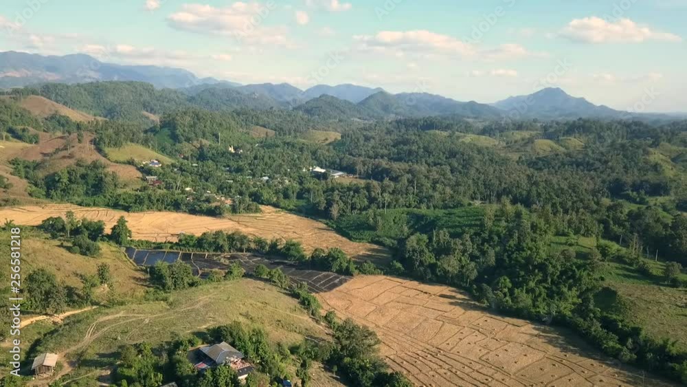 Aerial View, Flying over the mountains and forest with beautiful clouds and sky in sunrise,Landscape nature with aerial camera bird eye view. Aerial View, Flying over the mountains and forest with beautiful clouds and sky in sunrise,Landscape nature with aerial camera bird eye view.