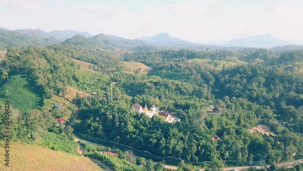 Aerial View, Flying over the mountains and forest with beautiful clouds and sky in sunrise,Landscape nature with aerial camera bird eye view. Aerial View, Flying over the mountains and forest with beautiful clouds and sky in sunrise,Landscape nature with aerial camera bird eye view.