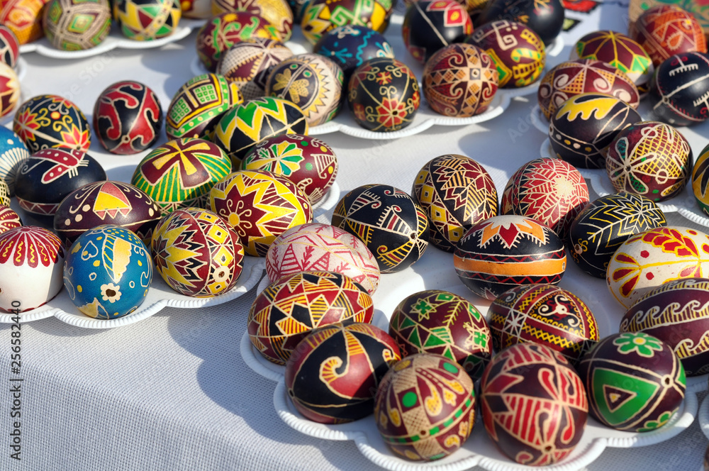 lots of colorful easter eggs with traditional spring design