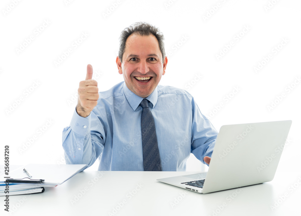 Mature caucasian businessman working on laptop computer at office in happy working and satisfaction Mature caucasian businessman working on laptop computer at office in happy working and satisfaction
